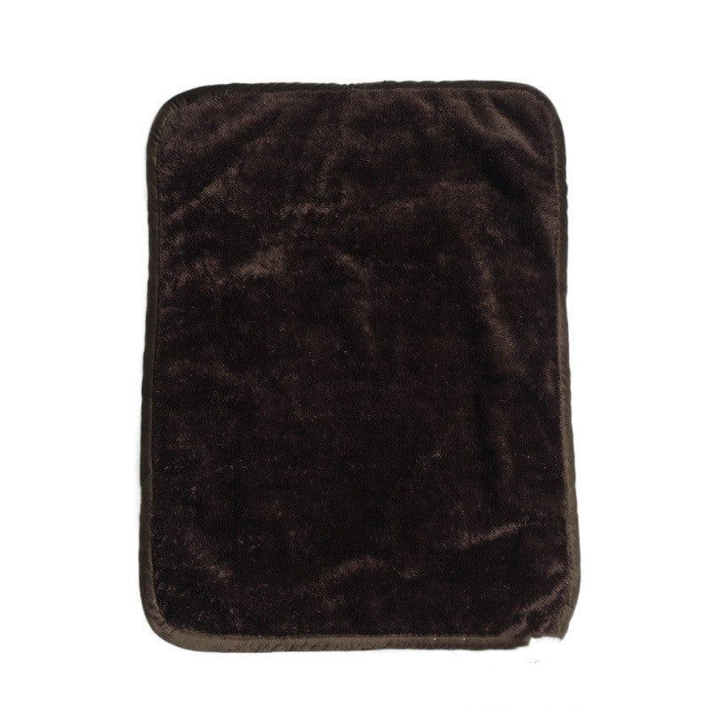 Dog lying on a urine-proof pet blanket